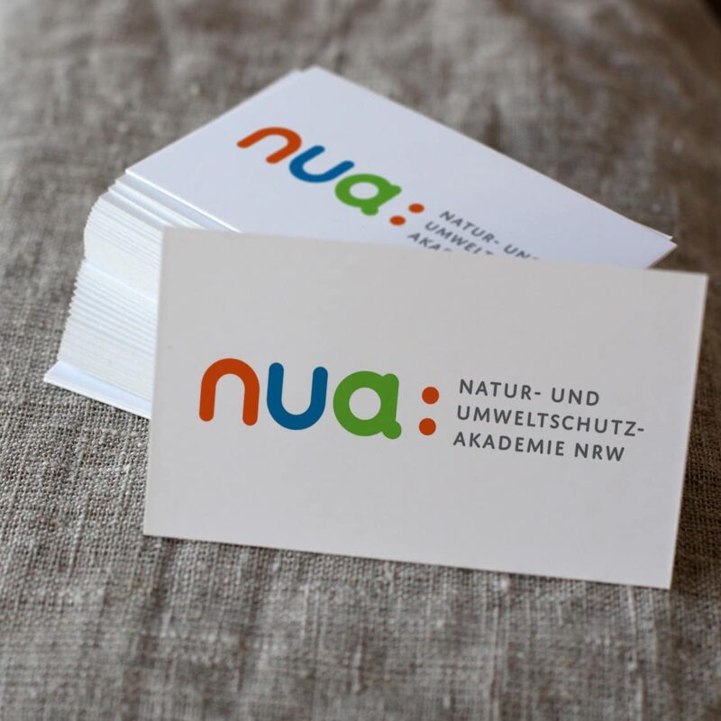 NUA_eCouleur_Referenz_mockup_Logoredesign_print